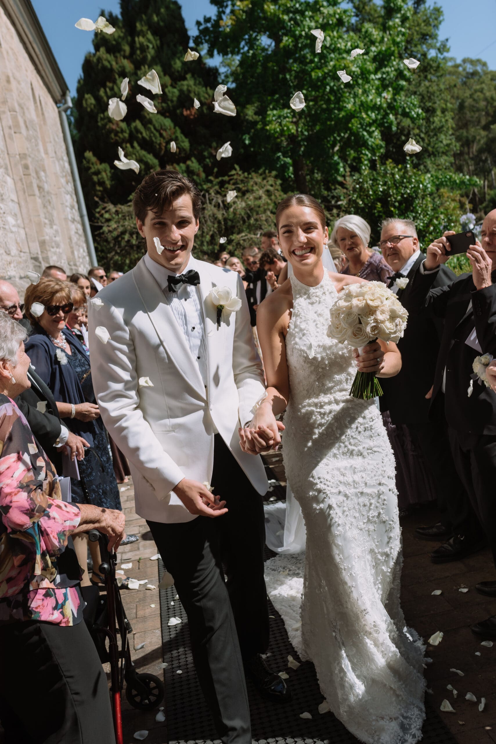 Beautiful adelaide hills wedding, couple walking through confetti